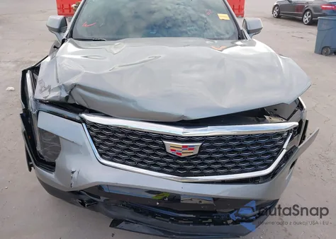 2024 Cadillac Xt4 Fwd Premium Luxury from USA, damaged, VIN 1GYFZCR44RF199579